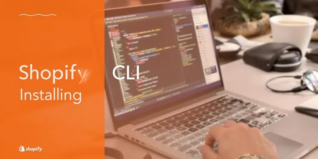 Developer coding on laptop with coffee and gadgets.